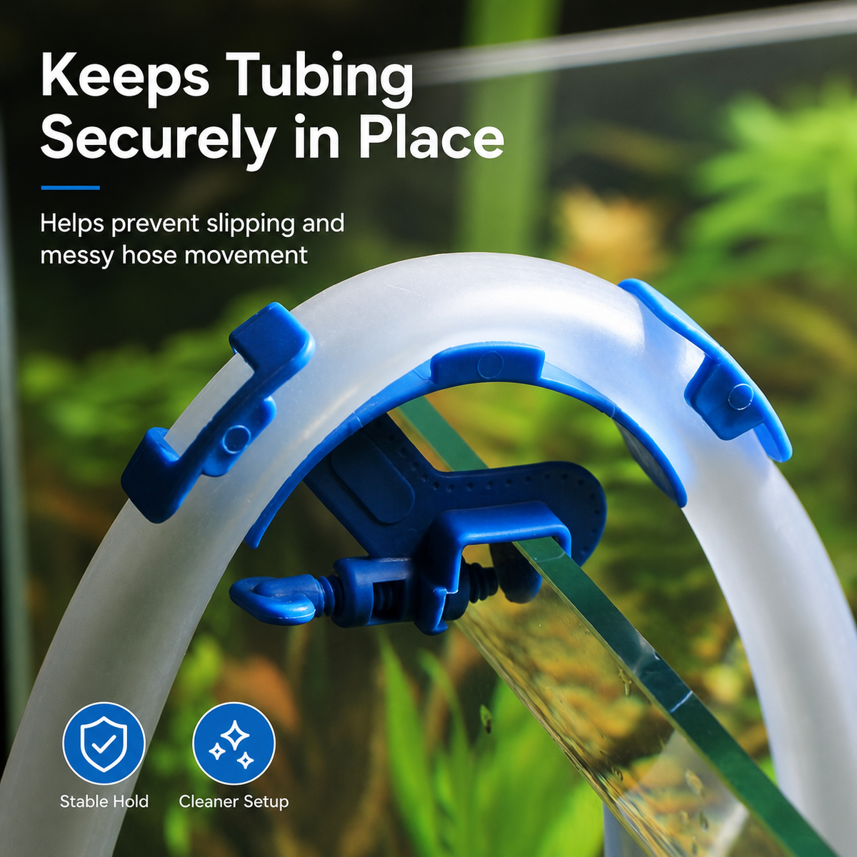 Aquarium hose holder keeping tubing securely in place on fish tank glass